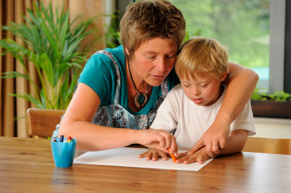 mom helping spec needs boy